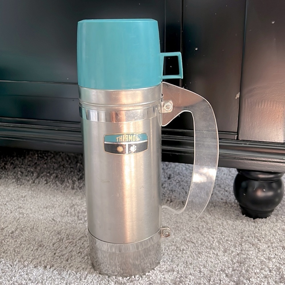 Vintage thermos with transparent handle